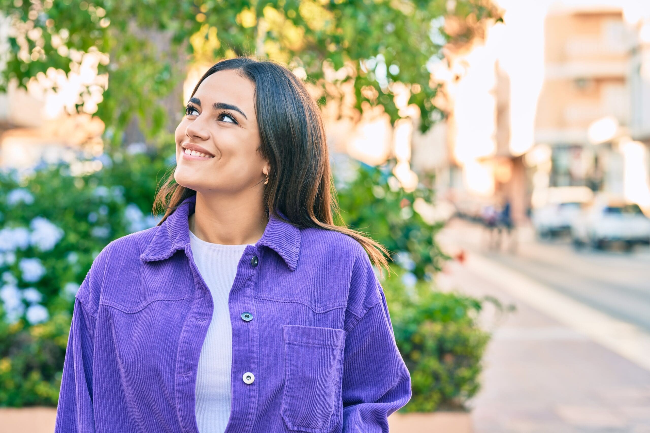 Young Latina woman looking forward with confidence, representing self doubt latina journey and personal growth